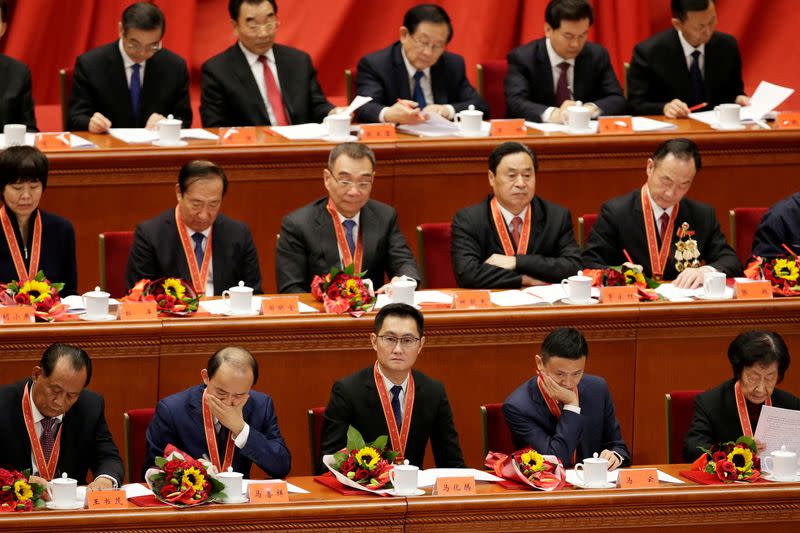 FILE PHOTO: Tencent's Chief Executive Officer Pony Ma, Alibaba's Executive Chairman Jack Ma and others attend an event marking the 40th anniversary of China's reform and opening up at the Great Hall of the People in Beijing