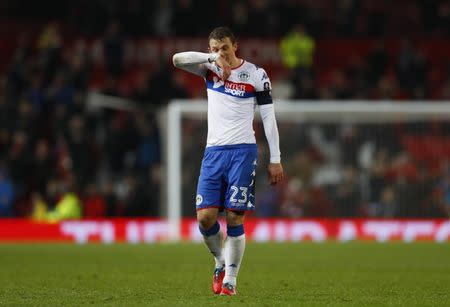 Britain Football Soccer - Manchester United v Wigan Athletic - FA Cup Fourth Round - Old Trafford - 29/1/17 Wigan Athletic's Stephen Warnock looks dejected after the game Action Images via Reuters / Jason Cairnduff Livepic EDITORIAL USE ONLY. No use with unauthorized audio, video, data, fixture lists, club/league logos or "live" services. Online in-match use limited to 45 images, no video emulation. No use in betting, games or single club/league/player publications. Please contact your account representative for further details.