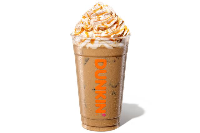 <p>Courtesy of Dunkin'</p> Dunkin' Iced Churro Signature Latte