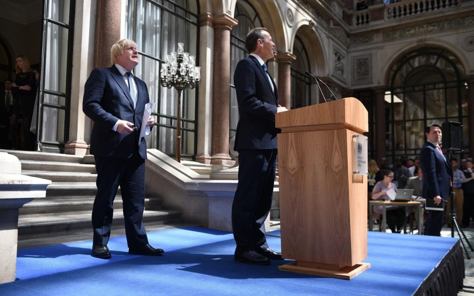 Simon McDonald is pictured alongside Boris Johnson at an event in the Foreign Office in July 2016 when he was permanent secretary at the department  - Andrew Matthews/PA