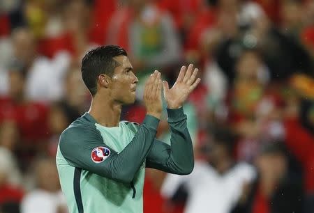 Football Soccer - Croatia v Portugal - EURO 2016 - Round of 16 - Stade Bollaert-Delelis, Lens, France - 25/6/16 Portugal's Cristiano Ronaldo applauds fans at the end of the match REUTERS/Lee Smith/ Livepic