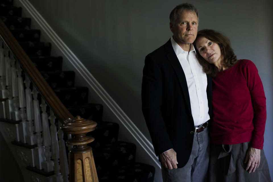 Fred and Cindy Warmbier stand in their home. Their son, Otto Warmbier was incarcerated in North Korea after having been convicted and sentenced to 15 years' hard labor for 'hostile acts against the DPRK'.&nbsp;