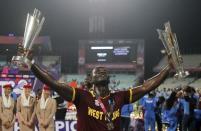 Cricket - England v West Indies - World Twenty20 cricket tournament final - Kolkata, India - 03/04/2016. West Indies captain Darren Sammy holds trophies after winning the final. REUTERS/Rupak De Chowdhuri