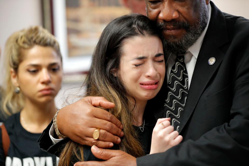 Aria Siccone, 14, a survivor of the Marjory Stoneman Douglas High School massacre, cries as she recounts her story to state Rep. Barrinton Russell on Feb. 21, 2018, at the state Capitol in Tallahassee, Fla.