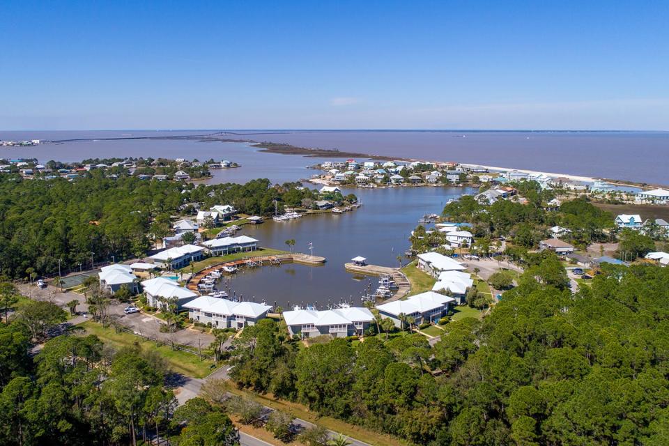 Aerial views of a harbor, Fort Gaines and a bird sanctuary on Dauphin Island, Alabama