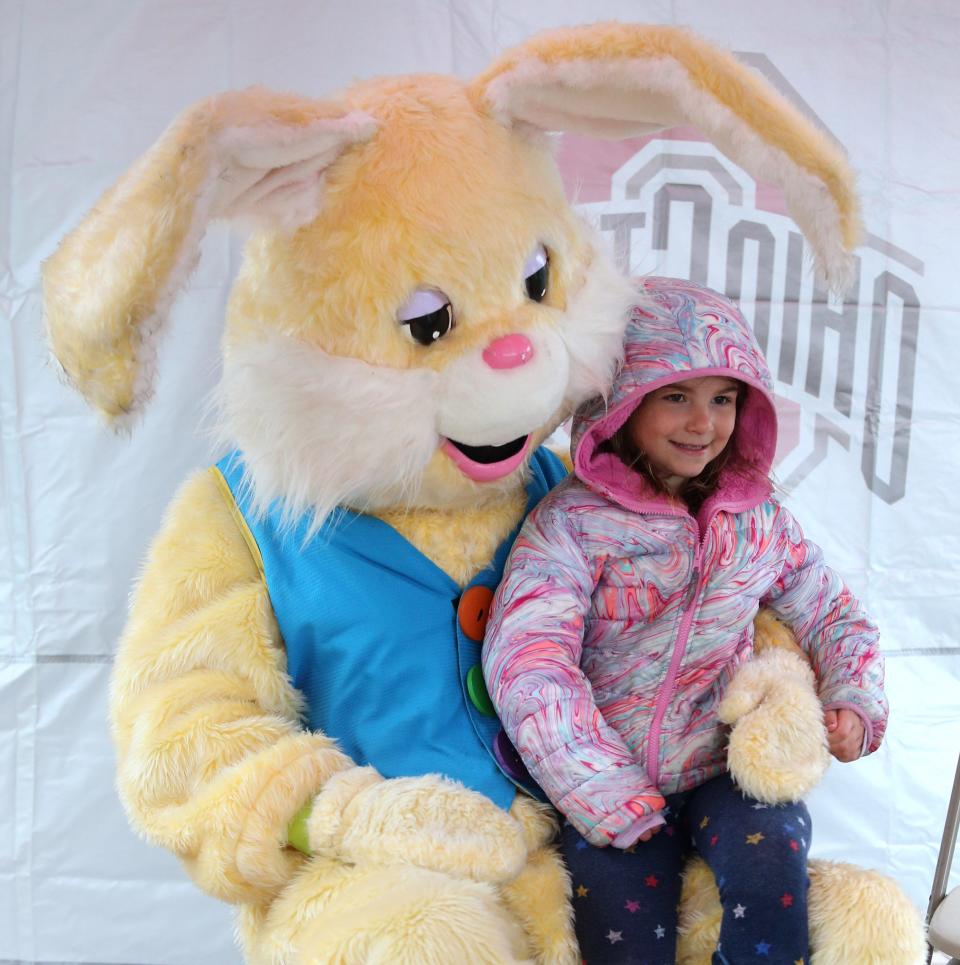 Josephine Wyman met the Easter Bunny on Saturday during the North Canton Jaycees' annual Easter Egg Hunt in North. With Josephine was her brother Gabriel Wyman.