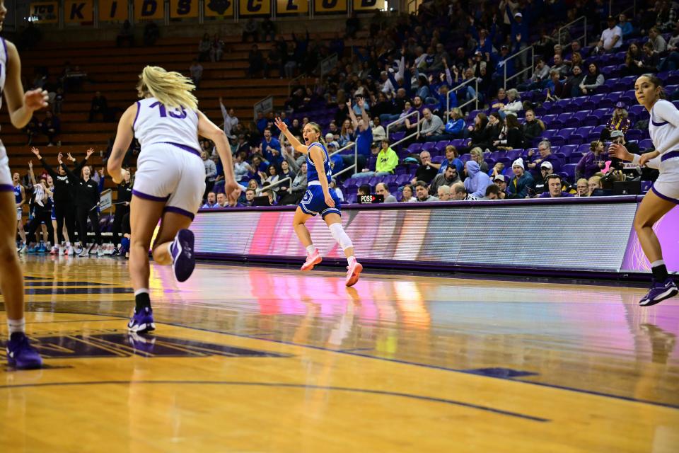 Megan Meyer celebrates a score during a game between Drake and UNI women's basketball. It was Meyer's first game back since returning to the Bulldogs on Feb. 1, 2024.