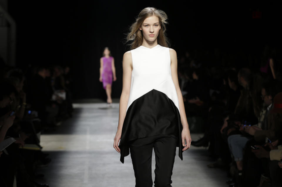 The Narciso Rodriguez Fall 2013 collection is modeled during Fashion Week in New York, Tuesday, Feb. 12, 2013. (AP Photo/Seth Wenig)