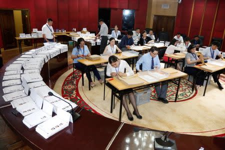 Election officials count votes in the presidential election in Ulaanbaatar, Mongolia, June 26, 2017. REUTERS/B. Rentsendorj