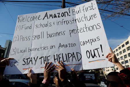 Demonstrators gather to protest Amazon's new location workplace in Long Island City of the Queens borough of New York, U.S., November 14, 2018. REUTERS/Shannon Stapleton/Files