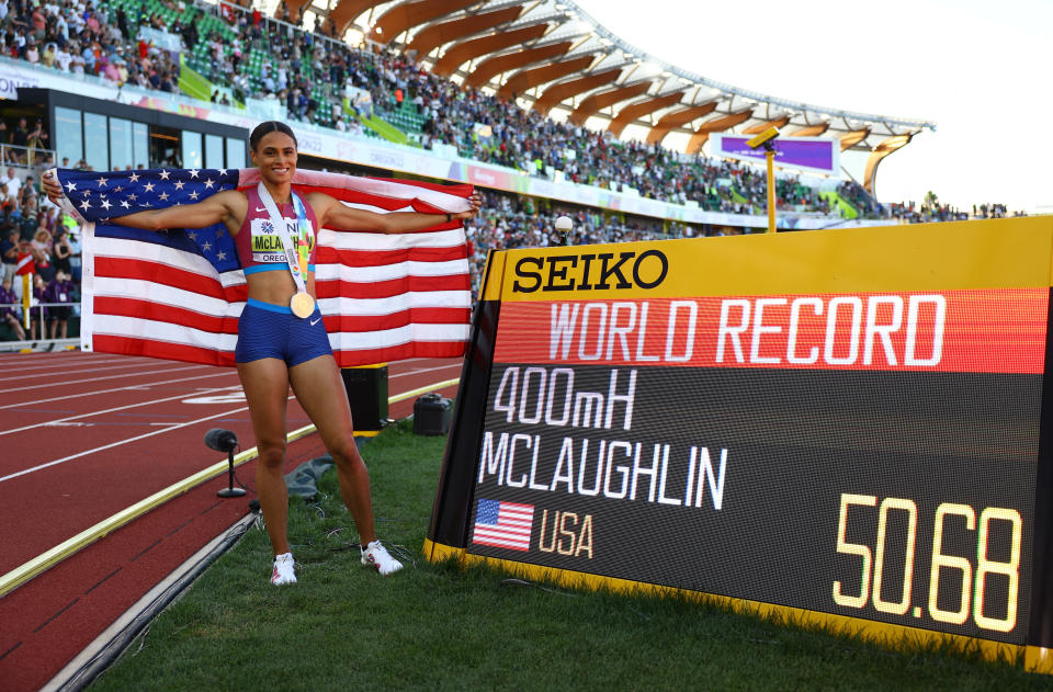 American Sydney McLaughlin celebrates after winning the women's 400-meter hurdles while breaking her own world record at the World Athletics Championships in Eugene, Oregon (Kai Pfaffenbach/Reuters)