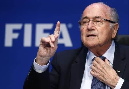 Re-elected FIFA President Sepp Blatter gestures during news conference after an extraordinary Executive Committee meeting in Zurich, Switzerland, May 30, 2015. REUTERS/Arnd Wiegmann