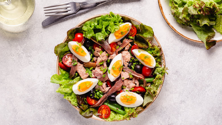 bowl of niçoise salad on table