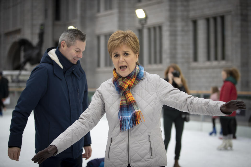 SNP leader Nicola Sturgeon and Finance Secretary Derek Mackay ice skate during a visit to the Aberdeen Christmas Market in The Quad, Marischal College, on the General Election campaign trail.