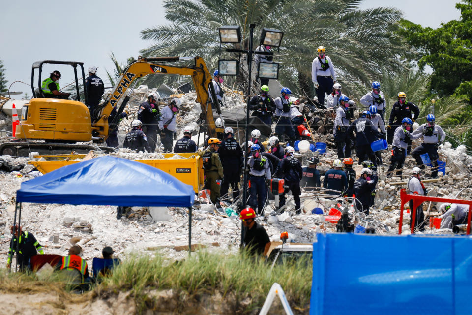 Rescue workers at the Champlain Tower in Surfside on July 5, 2021. / Credit: Eva Marie Uzcategui Trinkl/Anadolu Agency via Getty