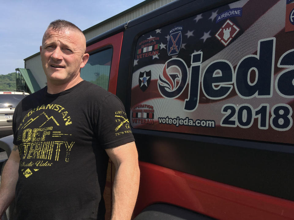 FILE - In this Tuesday, May 15, 2018 file photo, Richard Ojeda talks outside his campaign headquarters in Logan, W.Va. Former Army Maj. Richard Ojeda says his West Virginia congressional campaign was derailed by a Department of Veterans Affairs employee who's charged with leaking medical records. The former Democratic state senator and one-time presidential hopeful filed suit against the VA on Thursday, Aug. 22, 2019. (AP Photo/John Raby, File)