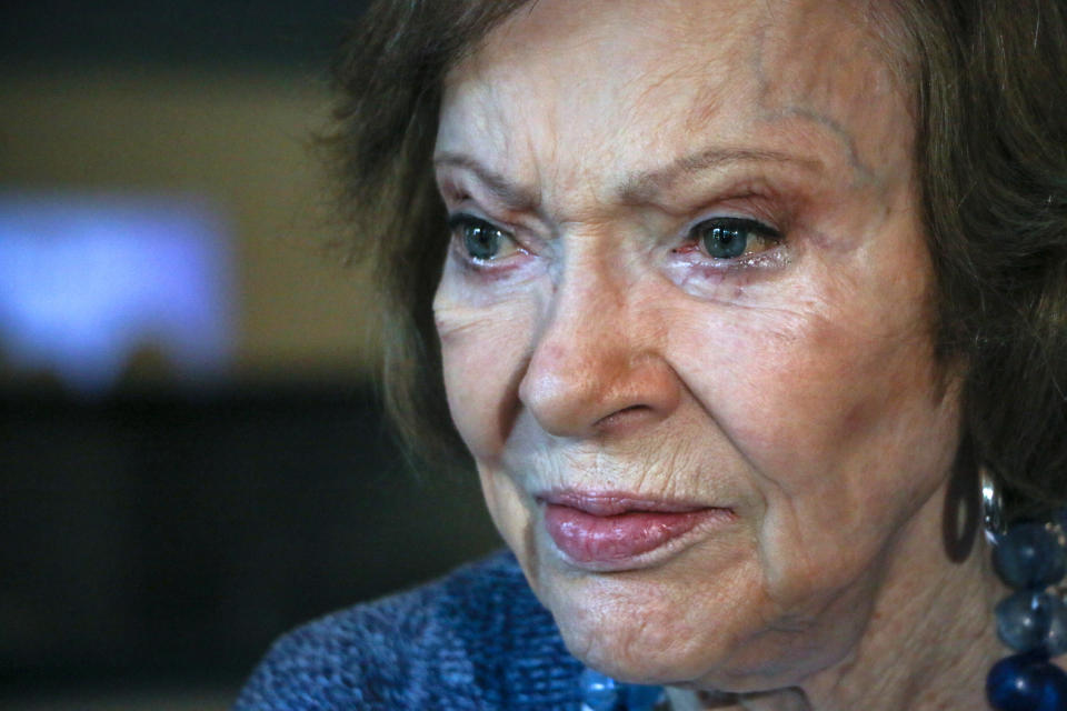 The former first lady Rosalynn Carter speaks to the press at conference at The Carter Center, Tuesday, Nov. 5, 2019, in Atlanta. Carter enjoyed a light lunch in the audience as a panel discussion led by Judy Woodruff, anchor of PBS NewsHour, took center stage. The former First Lady made remarks about her upbringing as a caregiver and the health of her husband, former President Jimmy Carter. (AP Photo/ Ron Harris)