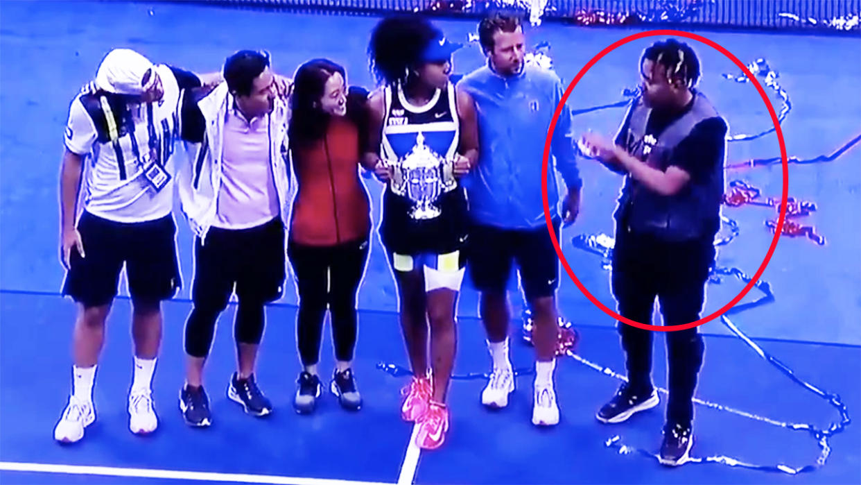 Naomi Osaka, pictured here with her team and boyfriend Cordae after her win in the US Open final.