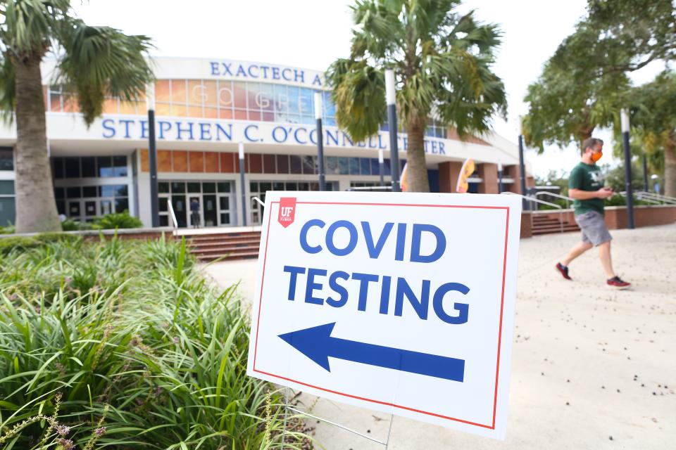 A University of Florida student leaves the O'Connell Center after taking a COVID-19 test.