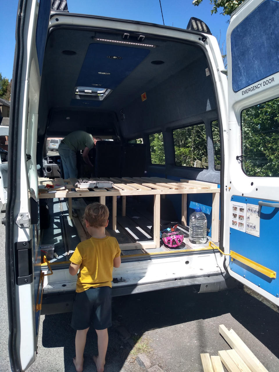 The couple refurbished the minibus before leaving their five-bedroomed house to live there. (Caters)