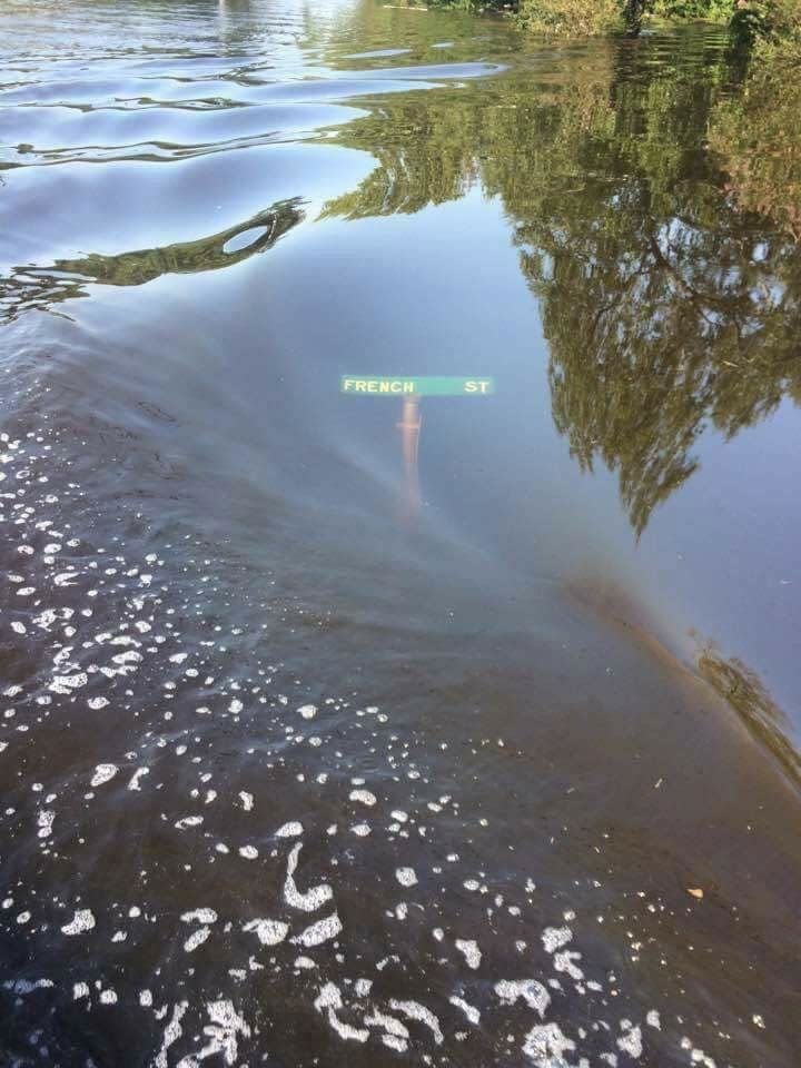 A street sign underwater