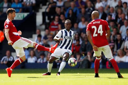 Football Soccer Britain - West Bromwich Albion v Middlesbrough - Premier League - The Hawthorns - 28/8/16 West Bromwich Albion's Saido Berahino in action with Middlesbrough's David Nugent and Emilio Nsue Action Images via Reuters / John Sibley Livepic