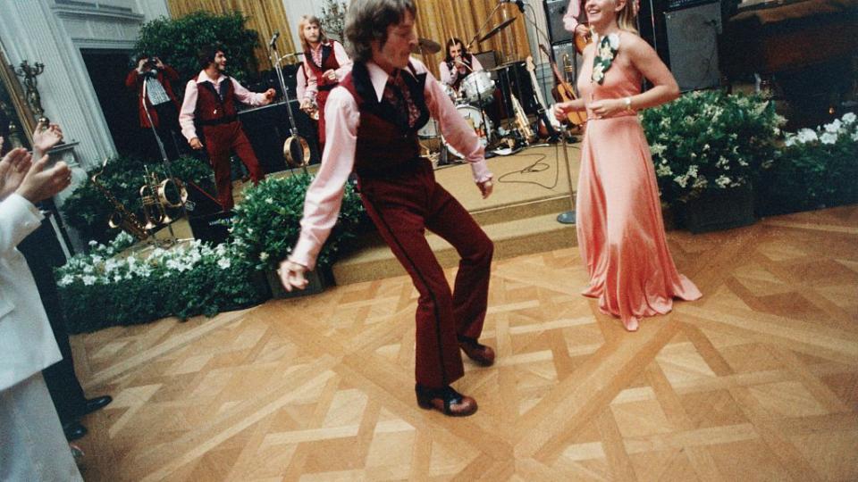 Susan Ford and her escort, William Pifer, dance during the 1975 Holton Arms School Senior Prom, held in the East Room of