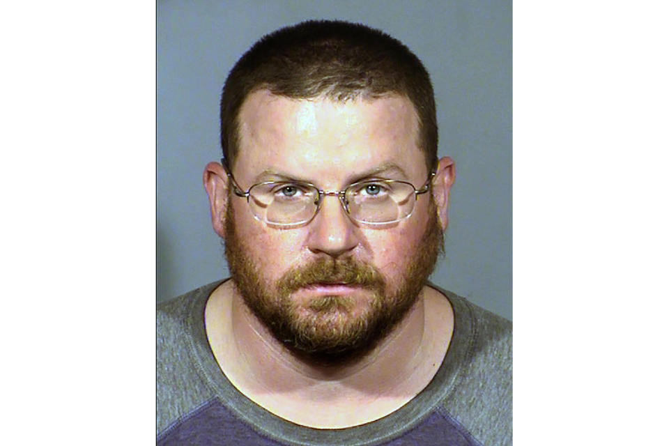 This undated booking photo provided by the Las Vegas Metropolitan Police Department shows William L. Loomis. He and two other Nevada men with ties to a loose movement of right-wing extremists advocating the overthrow of the U.S. government have been arrested on terrorism-related charges in what authorities say was a conspiracy to spark violence during recent protests in Las Vegas. (Las Vegas Metropolitan Police Department via AP)