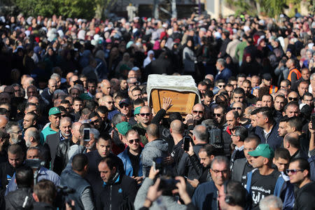 Relatives and friends carry the coffin of Aiia Maasarwe, 21, an Israeli student killed in Melbourne, during her funeral in her home town of Baqa Al-Gharbiyye, northern Israel January 23, 2019. REUTERS/Ammar Awad