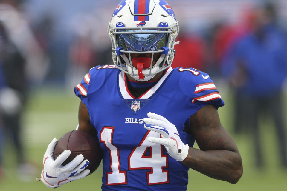 FILE - In this Monday Oct. 19, 2020 file photo,Buffalo Bills receiver Stefon Diggs (14) warms up prior to the first half of an NFL football game against the Kansas City Chiefs in Orchard park, N.Y. Buffalo's Stefon Diggs and Arizona's DeAndre Hopkins are two receivers who have flourished in their new homes after being traded to their respective teams just hours apart in March. The Bills travel to face the Cardinals in a game that's vital for both teams in their chase for the playoffs, Sunday, Nov. 15, 2020. (AP Photo/ Jeffrey T. Barnes)