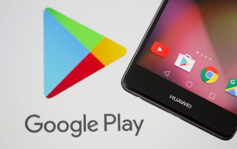 FILE PHOTO: A Huawei smartphone is seen in front of displayed Google Play logo in this illustration picture