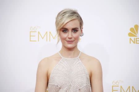 Taylor Schilling from Netflix "Orange is the New Black" arrives at the 66th Primetime Emmy Awards in Los Angeles, California August 25, 2014. REUTERS/Lucy Nicholson