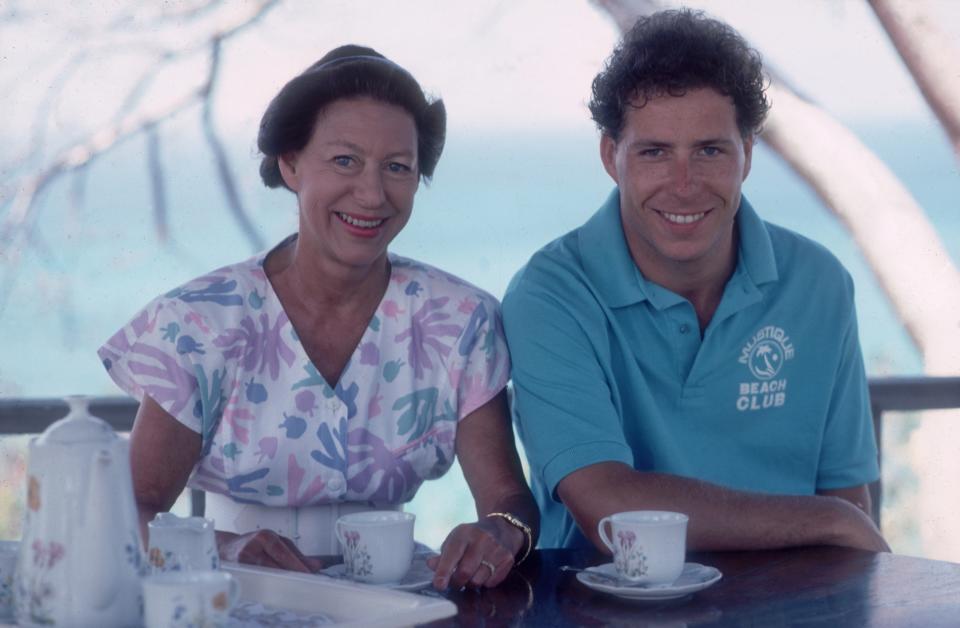 February 1989:  Princess Margaret (1930 - 2002) with her son David Linley on the island of Mustique in the Grenadines.  (Photo by Slim Aarons/Getty Images)