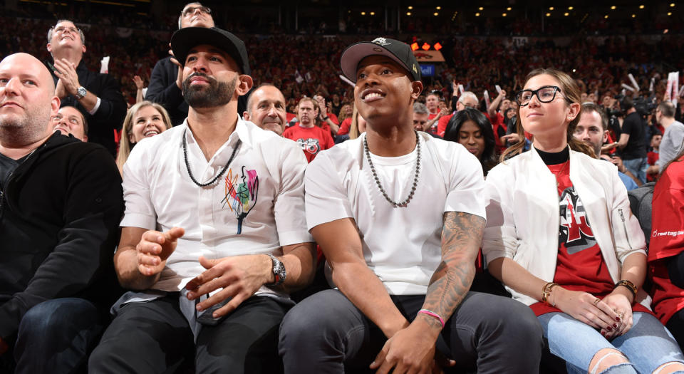 Jose Bautista and Marcus Stroman hooked up for another Raptors game on Friday night. (Getty)