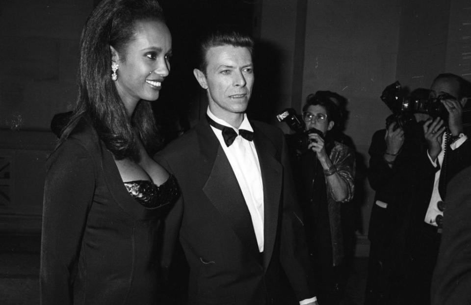 David Bowie and Iman attend the Metropolitan Museum of Art Costume Institute's annual gala to celebrate the 'Teatre de la Mode' exhibition on December 4, 1990 in New York.
