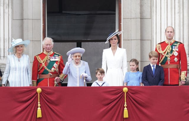 Royal family watches flypast