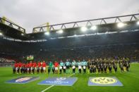 Football Soccer - Borussia Dortmund v AS Monaco - UEFA Champions League Quarter Final First Leg - Signal Iduna Park, Dortmund, Germany - 12/4/17 Borussia Dortmund and Monaco players line up before the game Reuters / Kai Pfaffenbach Livepic