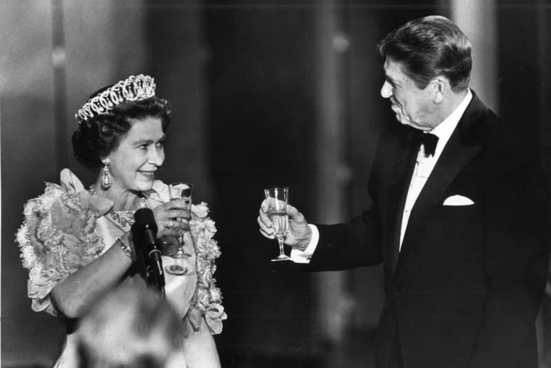 Queen Elizabeth II and President Ronald Reagan share a toast at the state dinner for the British Monarch at the M.H. De Young Museum late March 3, 1983. On March 8, 1983, Reagan referred to the Soviet Union as an "evil empire" in a speech before the British House of Commons. File Photo by Don Rypka/UPI