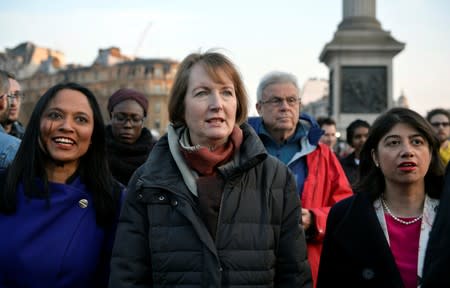 FILE PHOTO: Labour politician Harriet Harman joins a vigil in Trafalgar Square the day after an attack, in London