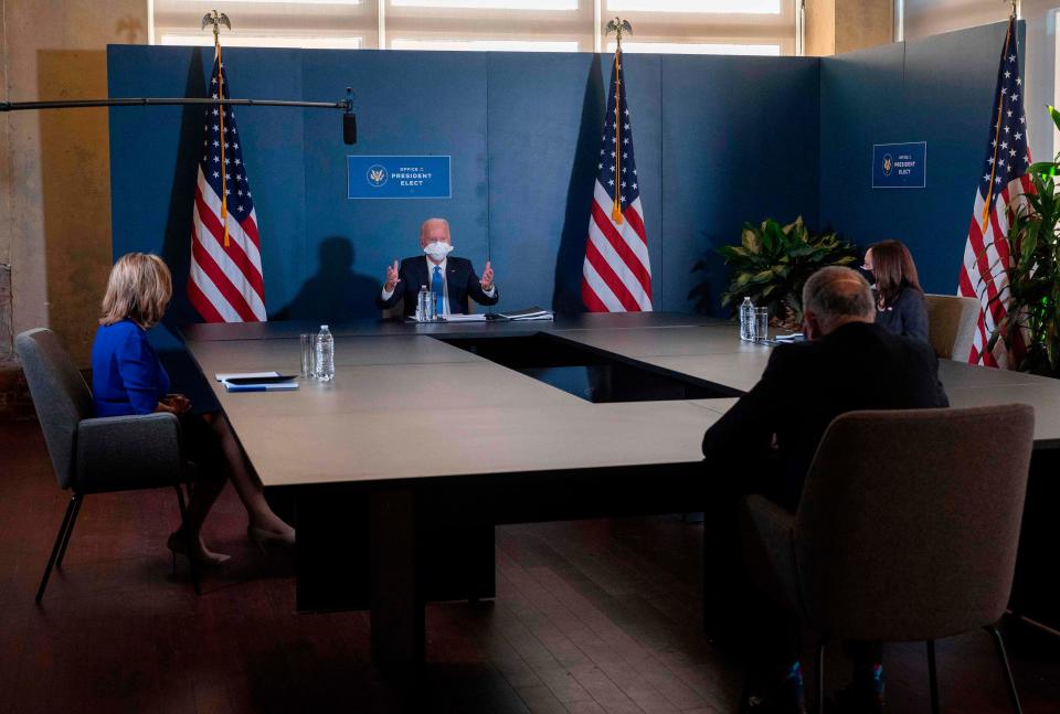 President-elect Joe Biden (center) speaks Nov. 20, 2020, with House Speaker Nancy Pelosi, D-Calif., and Senate Minority Leader Charles Schumer, D-N.Y., in Wilmington, Delaware.