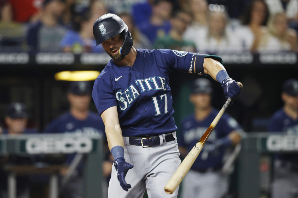 Seattle Mariners' Mitch Haniger reacts after striking out during the fourth inning of the team's baseball game against the Kansas City Royals in Kansas City, Mo., Saturday, Sept. 24, 2022. (AP Photo/Colin E. Braley)