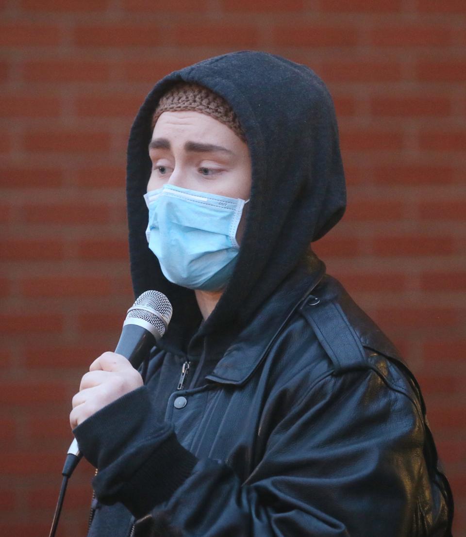 Candle, 17, shares their fears and concerns during a rally for trans rights at the Highland Square Branch Library on West Market Street in Akron on Wednesday. More than 50 people turned out to protest the Ohio Senate overriding the governor's veto of House Bill 68, which will restrict gender-affirming care for minors.