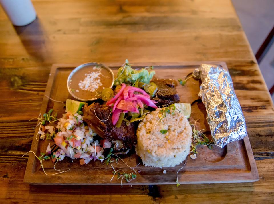 One of Verandah Cocina Latina's sizable entrees, the Carnitas Plate, at the new restaurants in Morton.