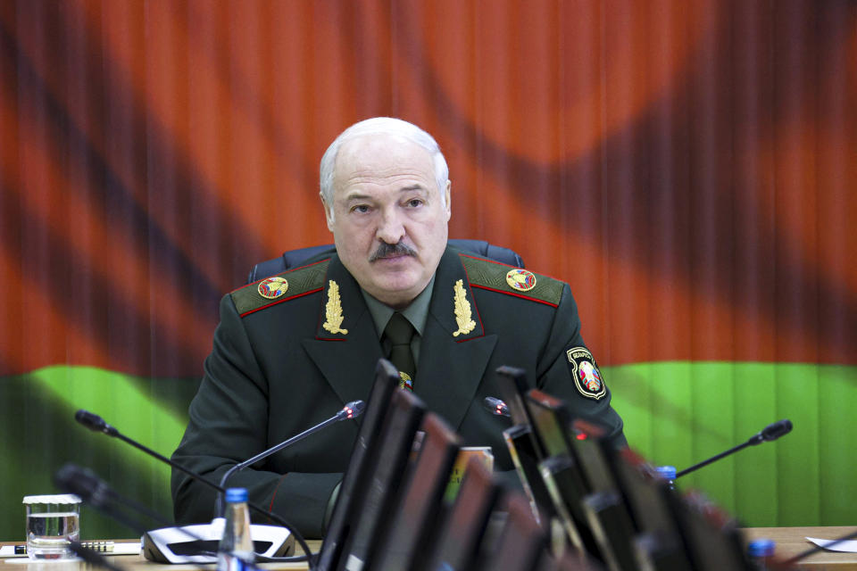 Belarusian President Alexander Lukashenko attends a meeting with top level military officials in Minsk, Belarus, Monday, Nov. 22, 2021. (Nikolay Petrov/BelTA Pool Photo via AP)