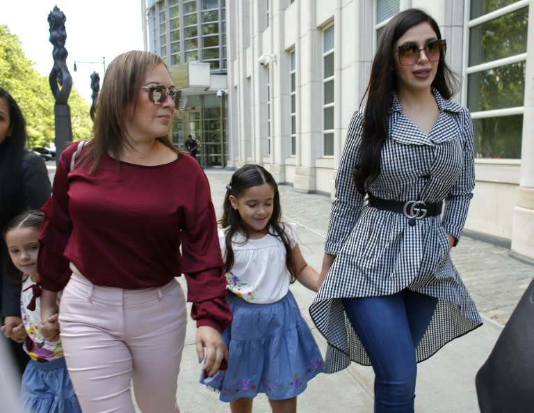 Guzman's wife Emma Coronel (R) leaves the US federal courthouse in Brooklyn with her twin daughters after a hearing in her husband's case in June 2018