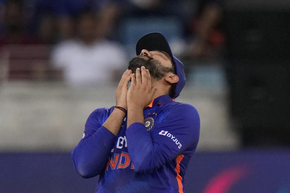 India's captain Rohit Sharma reacts during the T20 cricket match of Asia Cup between Sri Lanka and India, in Dubai, United Arab Emirates, Tuesday, Sept. 6, 2022. (AP Photo/Anjum Naveed)