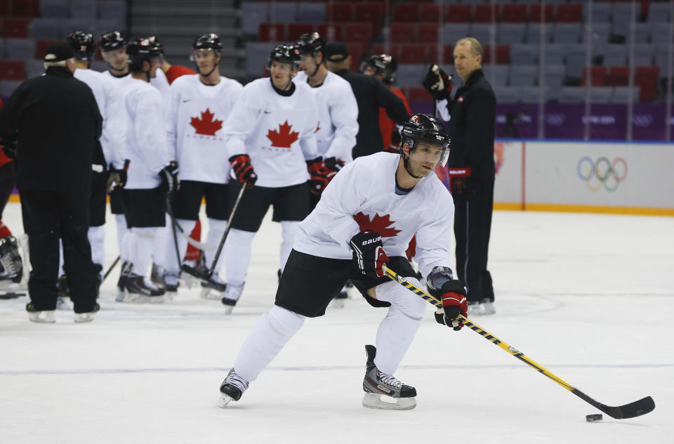 Canada forward Martin St. Louis looks to score during a training session at the 2014 Winter Olympics, Monday, Feb. 10, 2014, in Sochi, Russia. (AP Photo/Julie Jacobson)