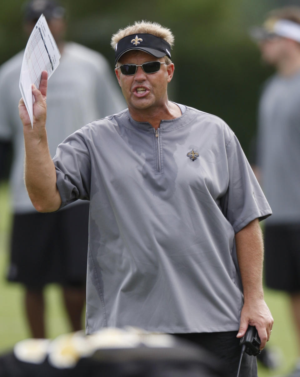 FILE - In this Friday, July 31, 2009, file photo, New Orleans Saints defensive coordinator Gregg Williams yells to the defense during the morning practice session at the club's NFL football training camp in Metairie, La. The revelations were shocking and revolting to those outside the NFL: A team paid bounties to knock opponents out of the game, including some of its biggest stars. Williams, the Saints former defense coordinator, apologized and admitted overseeing the sordid program, which involved between 22 and 27 defensive players and, according to the NFL, was carried out with the knowledge of head coach Sean Payton. (AP Photo/Bill Haber, File)