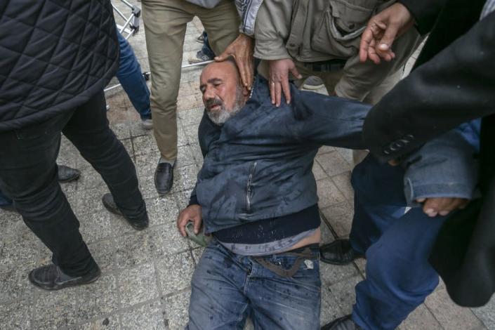 Tunisian security forces intervene in people, who gathered for sit-in protest against Tunisian President Kais Saied&#39;s &#39;extraordinary decisions&#39; in Tunis, Tunisia on December 18, 2021
