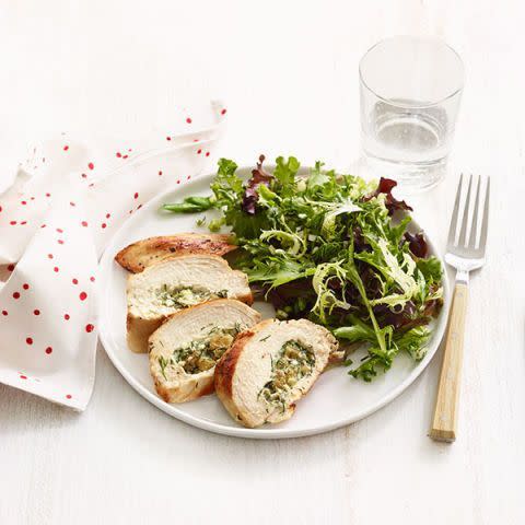 <p>Stuffing chicken breasts is a great way to kick things up a notch. This chicken looks oh so fancy, but it only takes half an hour to from start to finish. </p><p><em><a href="https://www.womansday.com/food-recipes/food-drinks/recipes/a12518/dill-raisin-cheese-stuffed-chicken-breasts-recipe-wdy0814/" rel="nofollow noopener" target="_blank" data-ylk="slk:Get the Dill, Raisin, and Cheese-Stuffed Chicken Breasts recipe.;elm:context_link;itc:0;sec:content-canvas" class="link ">Get the Dill, Raisin, and Cheese-Stuffed Chicken Breasts recipe. </a></em></p>